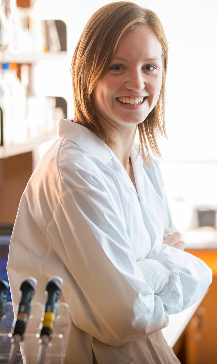 Girl in lab smiling